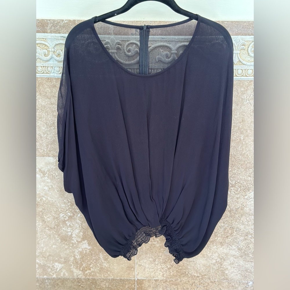 Black blouse by brand Muche et Muchette size small sheer
